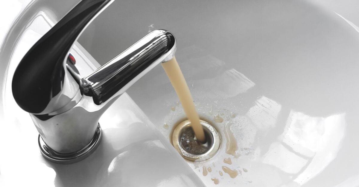 Brown water coming out of a tap